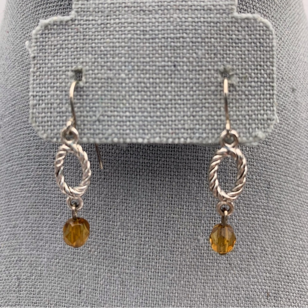 Silver Toned Swirl Oval Knot Dangle Earrings With Amber Colored Bead